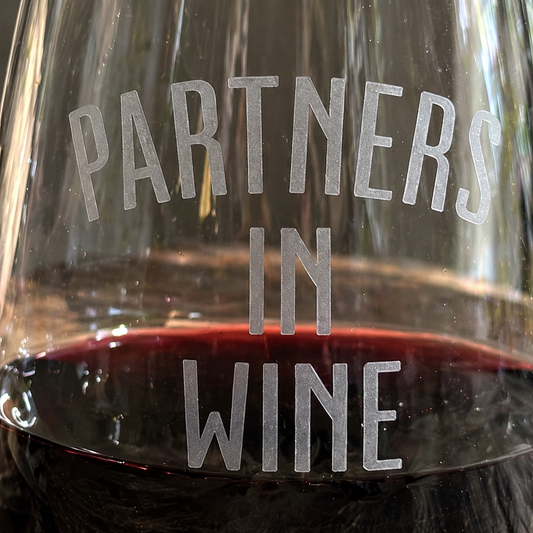 Partners in Wine Sandblasted Stemless Wine Glass by Expressive DeZien with permanent sandblasted artwork