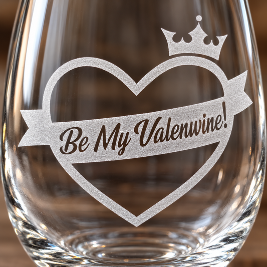 Be My Valenwine etched stemless wine glass. Close view of the heart outline, crown, and banner.