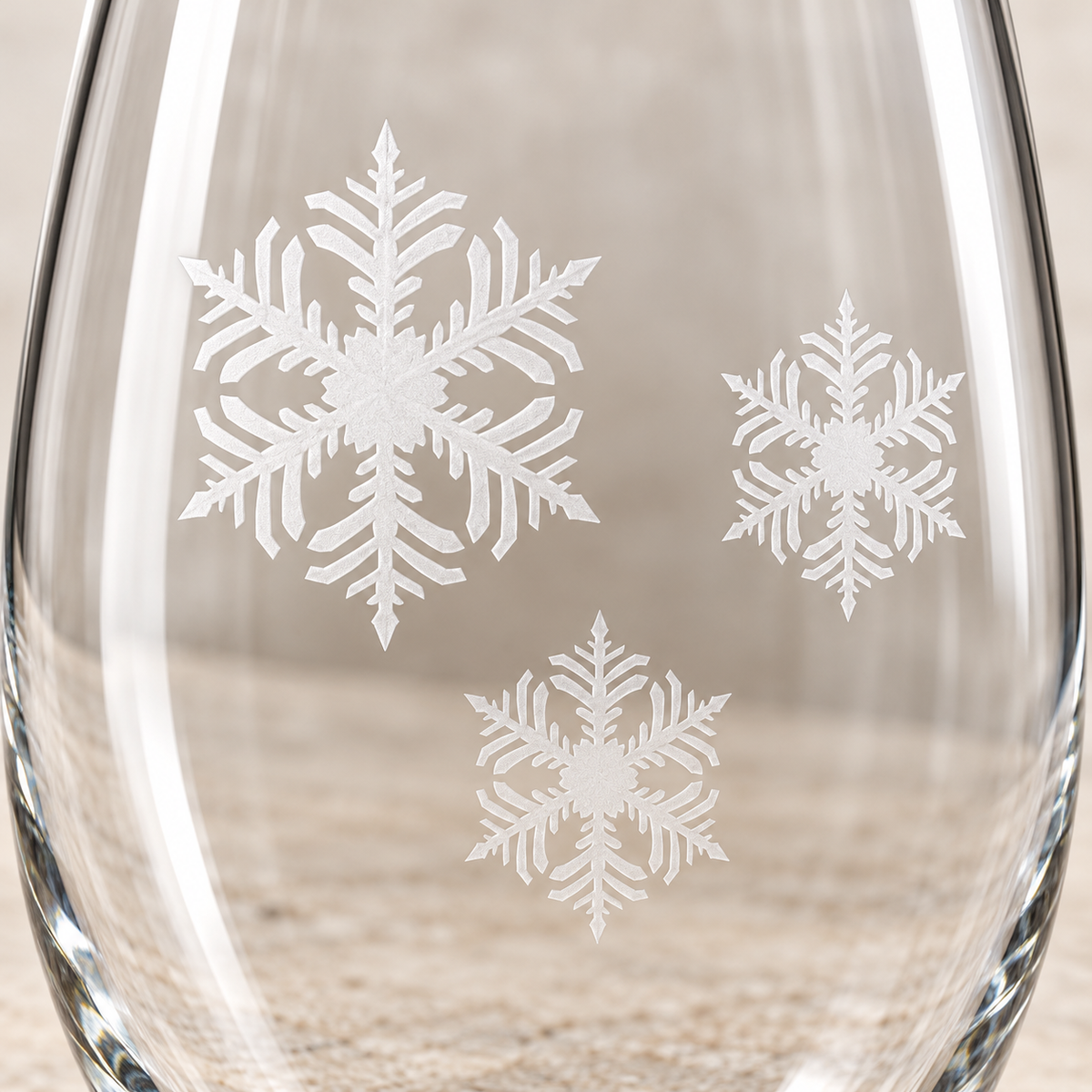 Celestial Frost Snowflake design, permanently sandblasted on a clear 20.5 oz stemless wine glass, product view 2