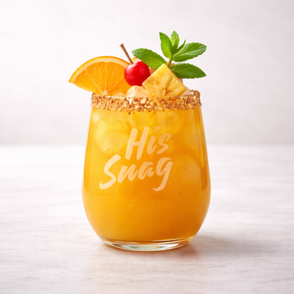 His Snag" 20.5oz etched stemless wine glass featuring an orange cocktail with an orange slice, cherry, pineapple, and mint garnishes on a white background by Expressive DeZien.