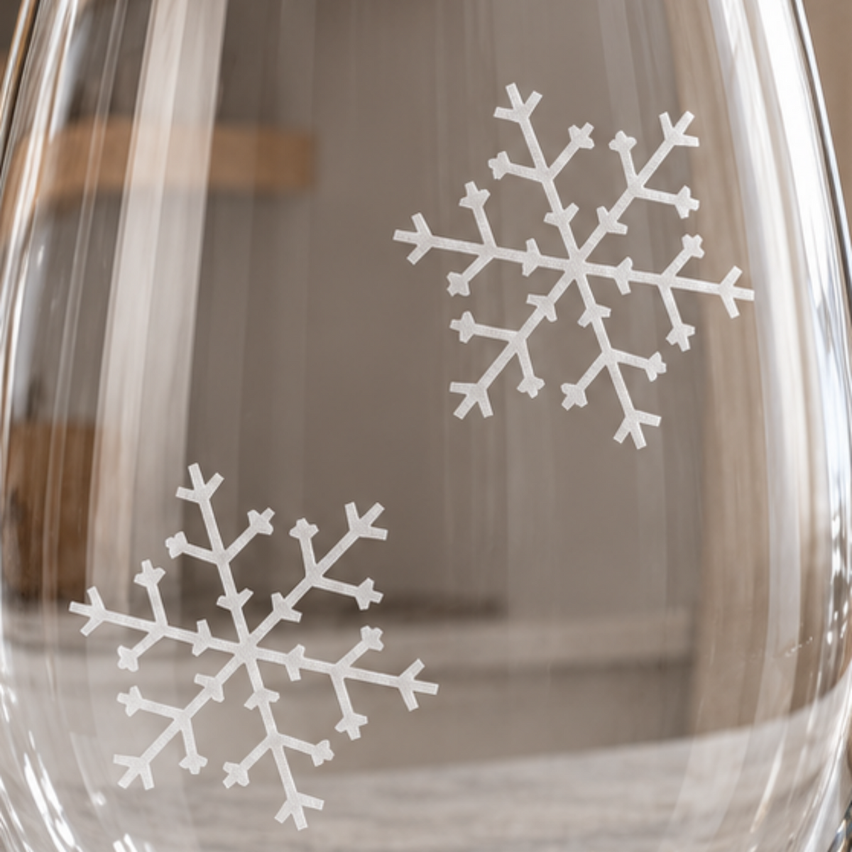 Arctic Elegance Snowflake design, permanently sandblasted on a clear 20.5 oz stemless wine glass, product view 2