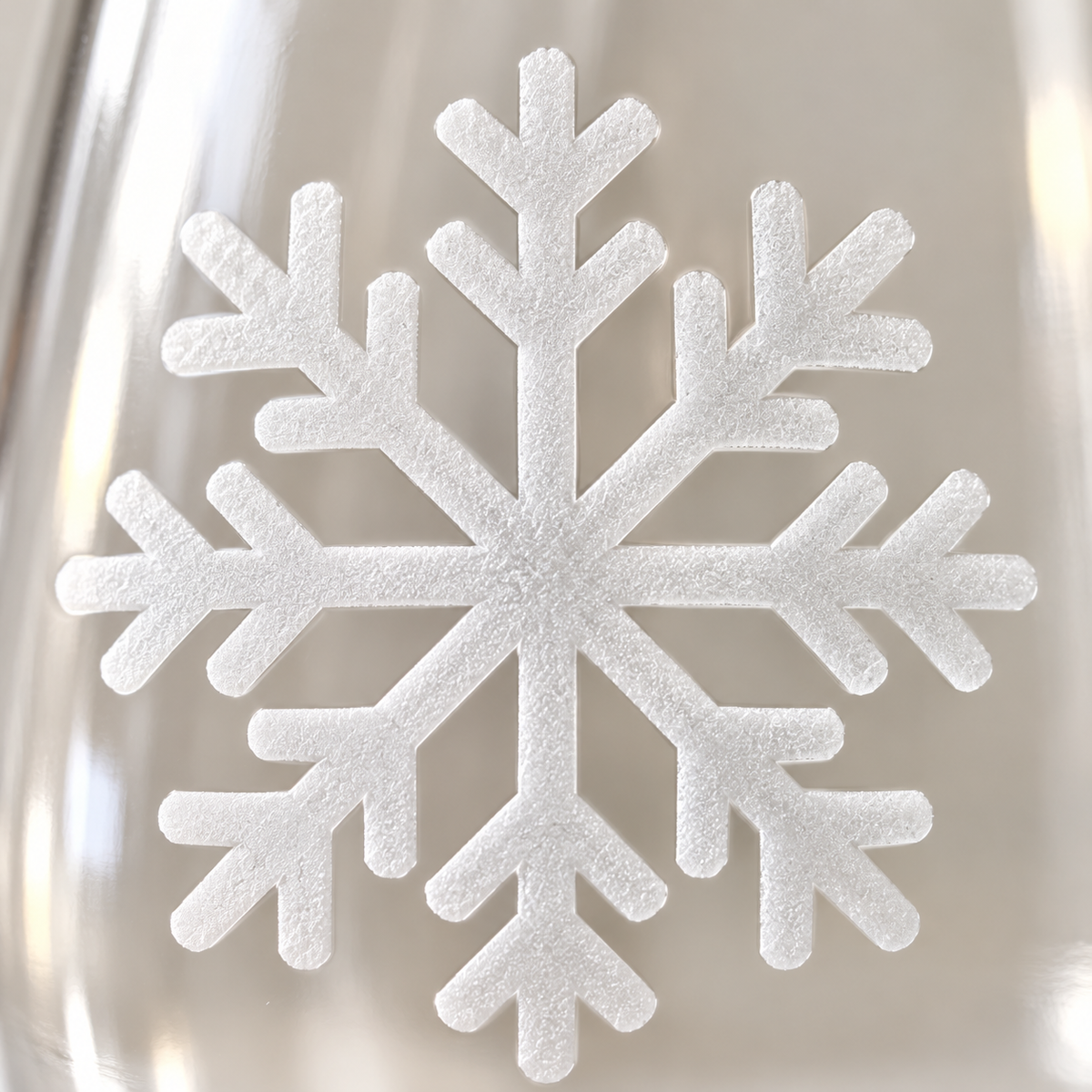 Frosty Lace Snowflake design, permanently sandblasted on a clear 20.5 oz stemless wine glass, product view 2